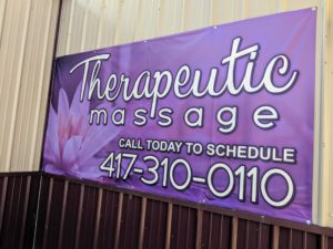 Banner for Nita Massage in Carthage, MO that says 'Therapeutic Massage. Call today to schedule 417-310-0110'. Print and design by netfishes.