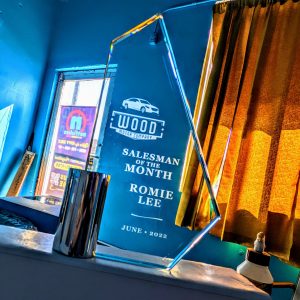 An 8 inch laser etched glass award designed by netfishes for Wood Motor's Salesman of the Month Award in Carthage, MO.