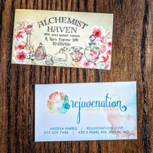 16 pt gloss business card. Front has a floral design along in pink and white colors as well as perfume bottles and Alchemist Haven and information on the back in a softer color palate with peach and green the words rejuvination and contact information