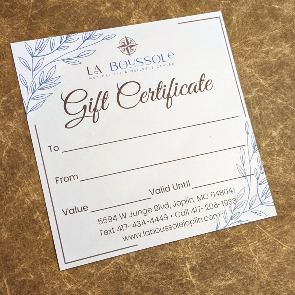 4 square inch gift certificate printed on postcard. The name La Boussole Medical Spa and Wellness Center at top and the words Gift Certificate in Gold with the information needed to complete gift certificate.