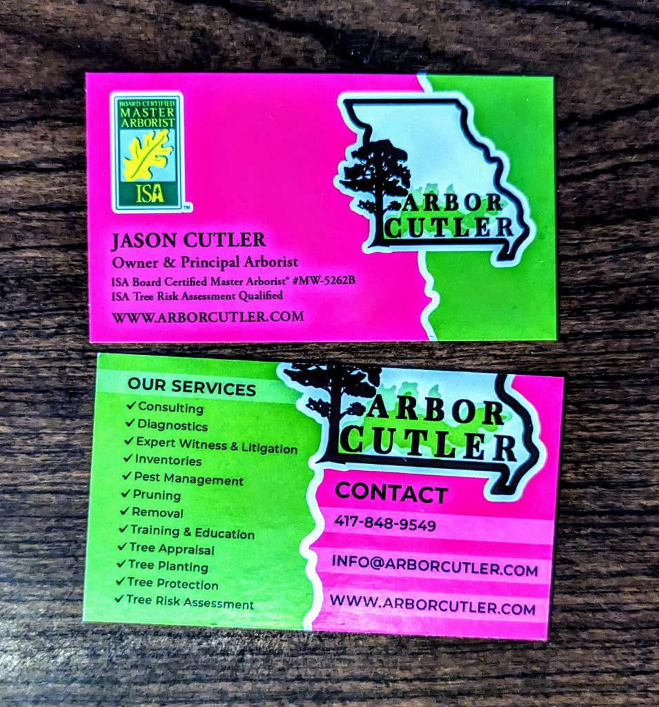 Lime green and hot pink double sided business card. Logo at the top that is framed by the outline of Missouri. Arbor Cutler in black with a tree in the outline. Has the name of the owner Jason Cutler and his certification on the front side with a split between the pink and green. On the back there is a line down the middle and the services offered on one side and contact information on the other side.