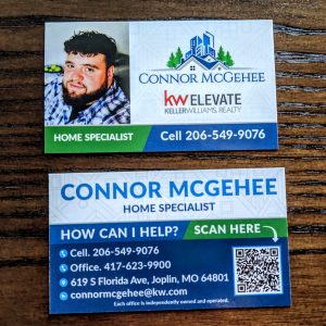 Front and back. Blue and White design with picture of Connor on front and Connors information as well as QR code on back