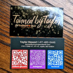 Gloss front with Tanned by Taylor@Radiant Glo on front. Back is matte finish with contact information as well as QR codes for website, instagram and facebook